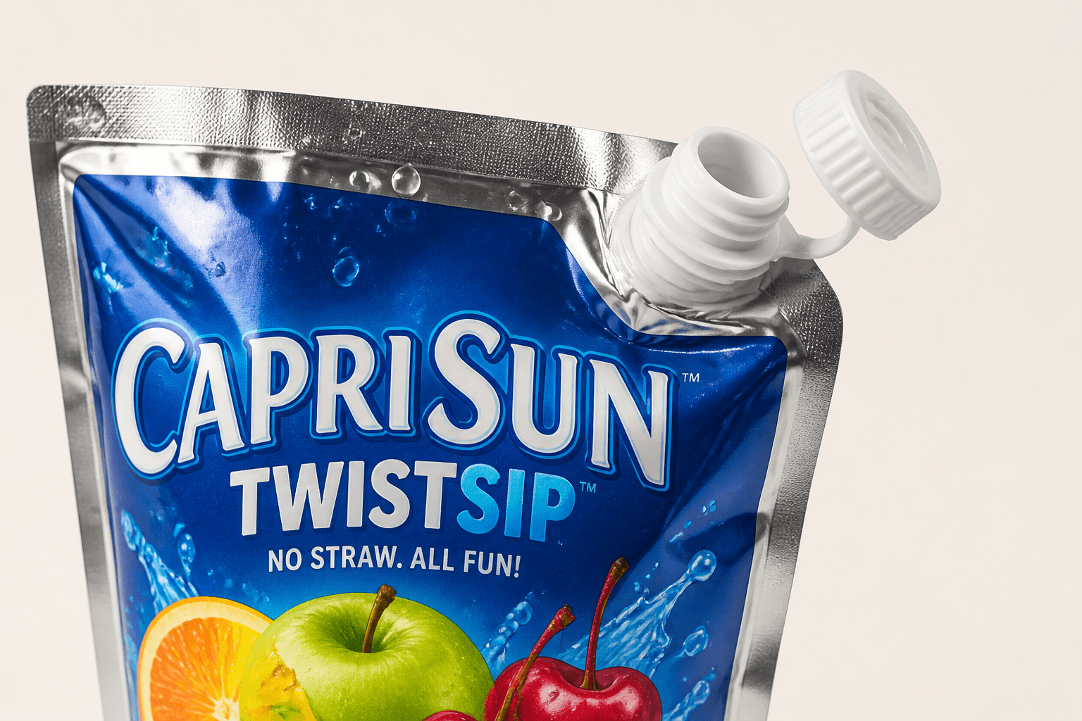 Close-up of speculative TwistSip twist spout on a Capri Sun-style juice pouch